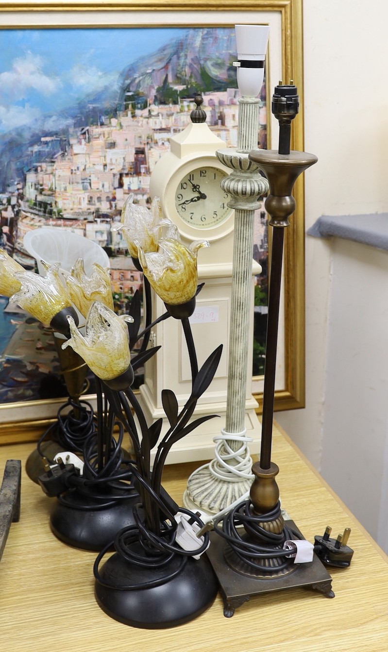 A clock and sundry lamps